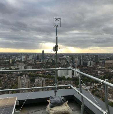 The ultrasonic anemometer on the roof of the tower, above the London skyline